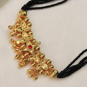 black bead mangalsutra gold pendant