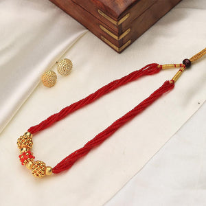 red multi strand bead necklace with gold beads