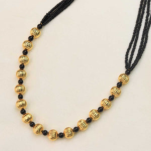 green bead gold necklace