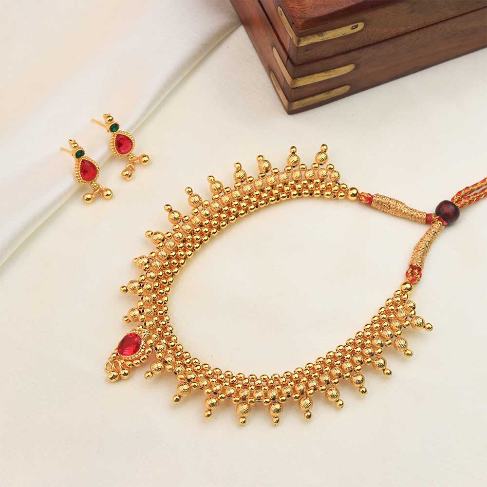 Gold kundan choker with ruby drops