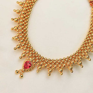 Gold kundan choker with ruby drops