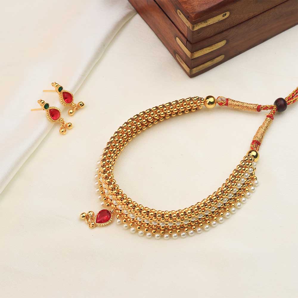 Gold choker with pearl detailing