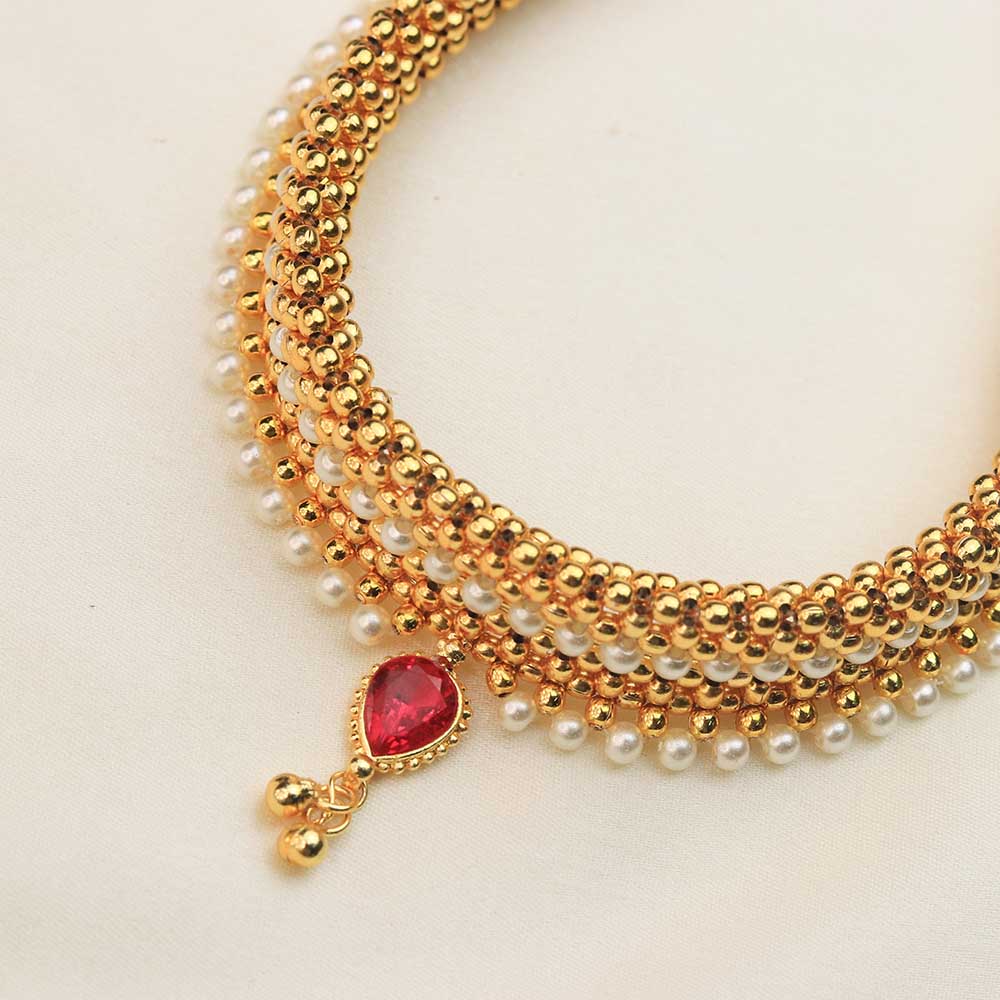 Gold choker with pearl detailing