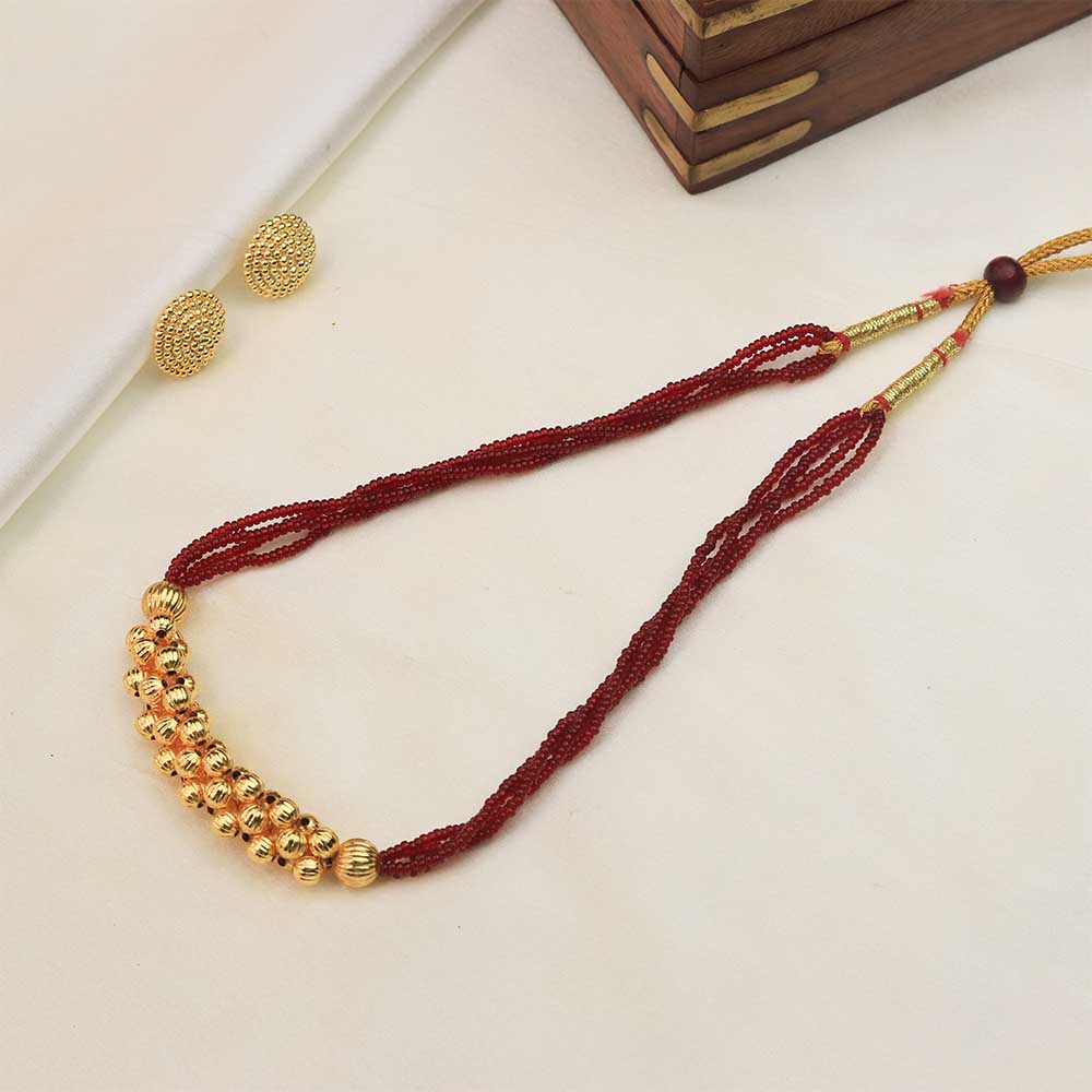 Red thread necklace with gold beads