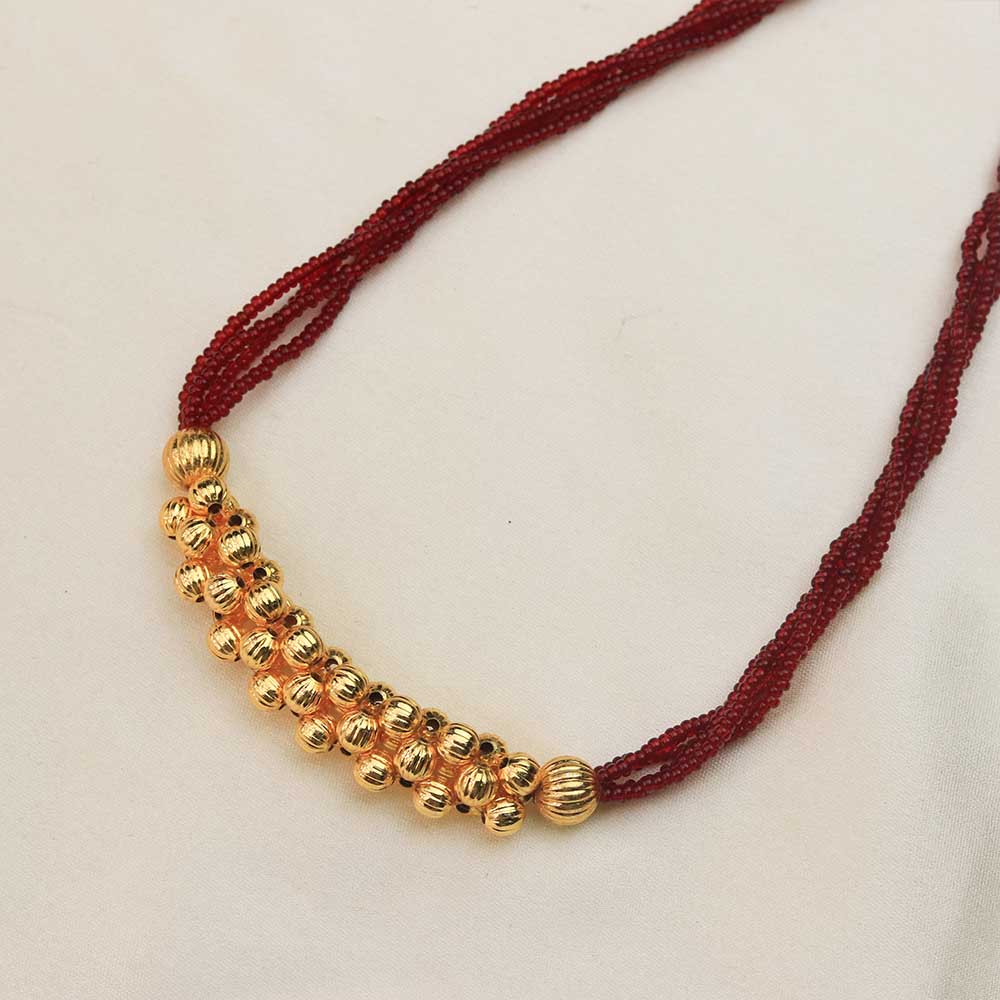 Red thread necklace with gold beads