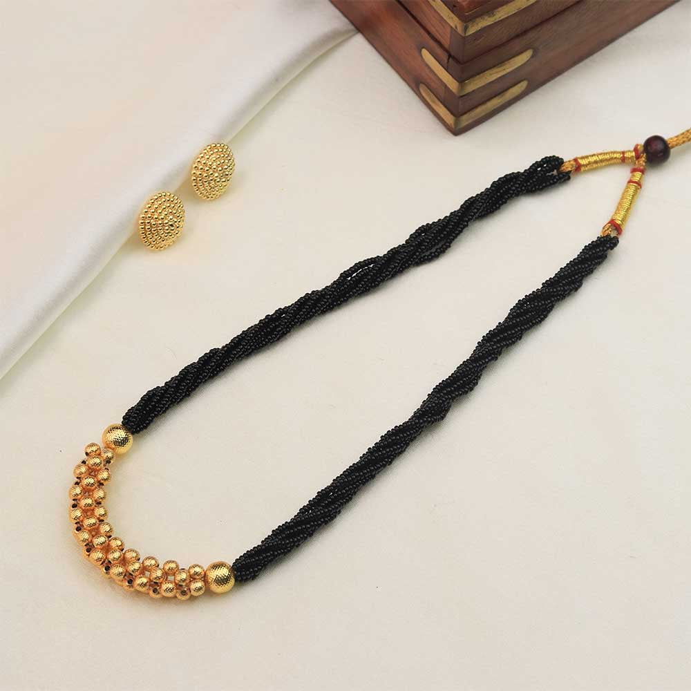 Gold necklace with pink beads