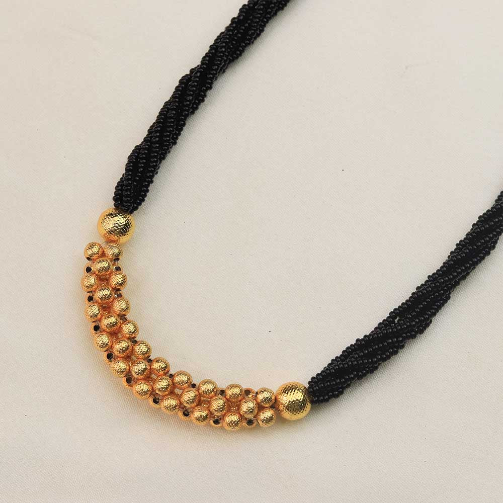 Gold necklace with pink beads