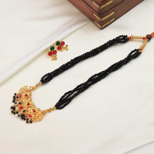 Black crystal necklace with temple pendant