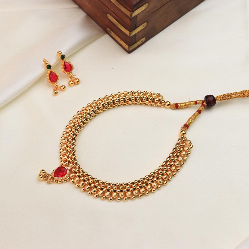  Gold necklace with colored stones 